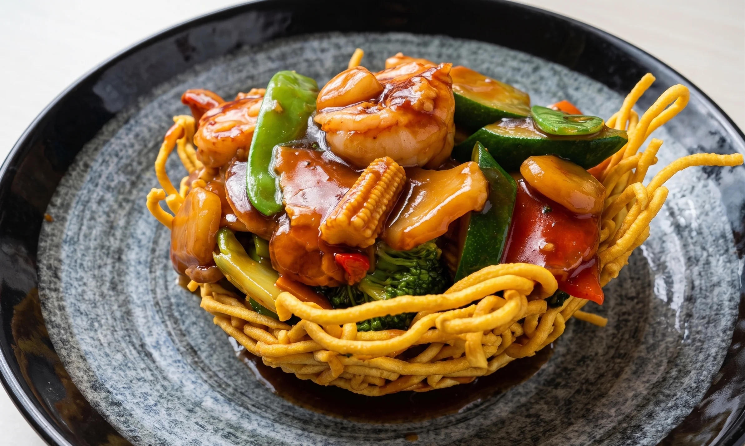 Crispy Chinese noodle basket with shrimp and vegetables