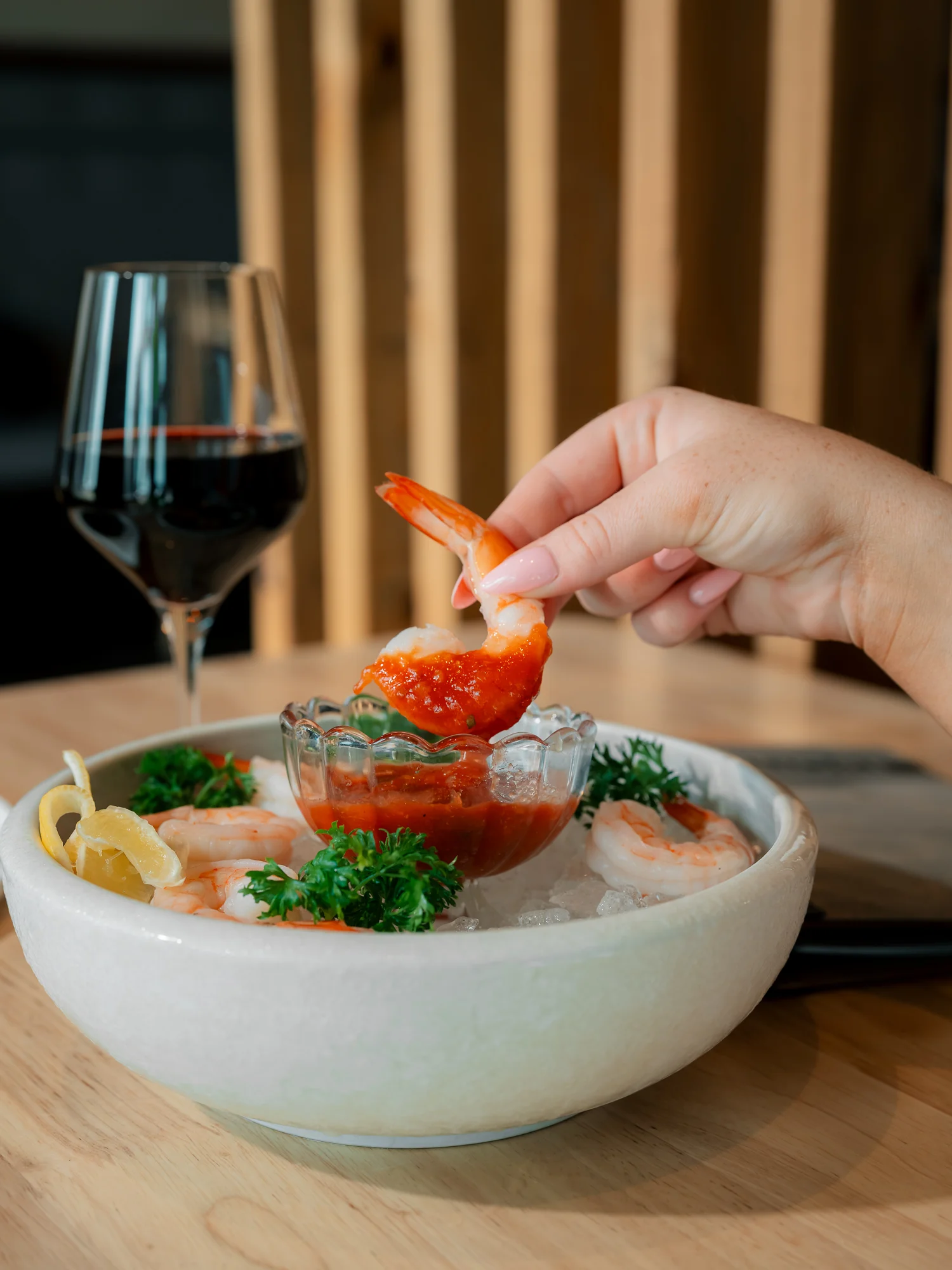 Chilled shrimp cocktail served with cocktail sauce