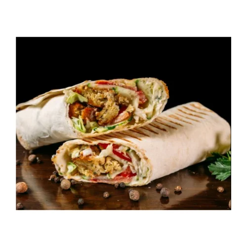 Grilled chicken shawarma wrap with fresh vegetables