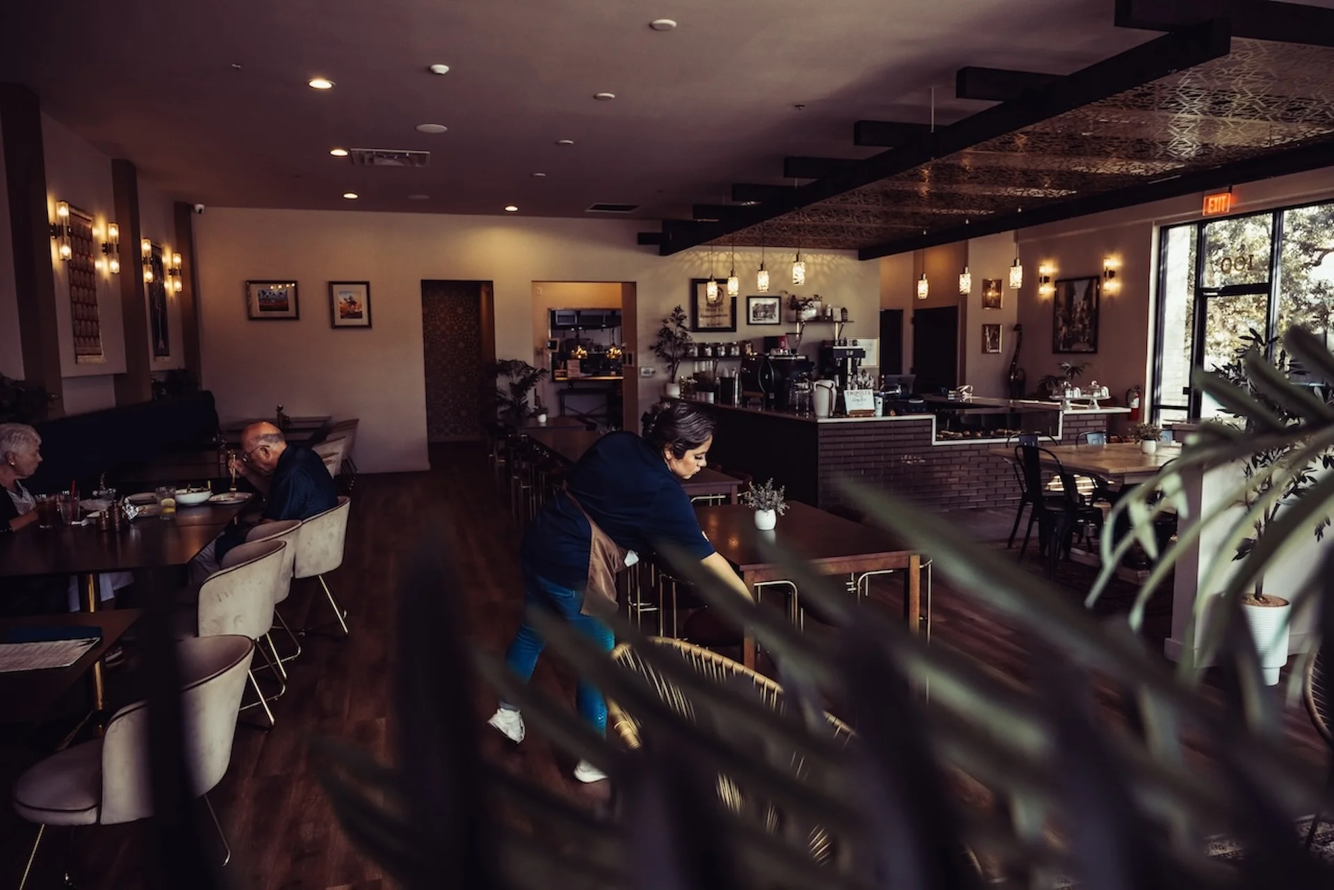 Cozy restaurant interior with modern decor and warm lighting