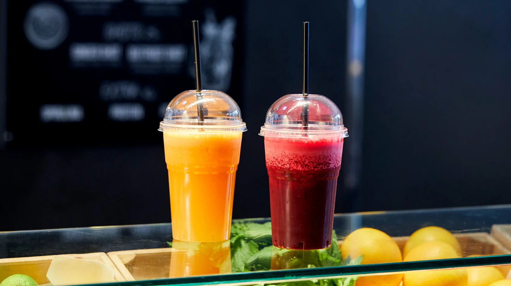 Refreshing fruit smoothies in clear cups