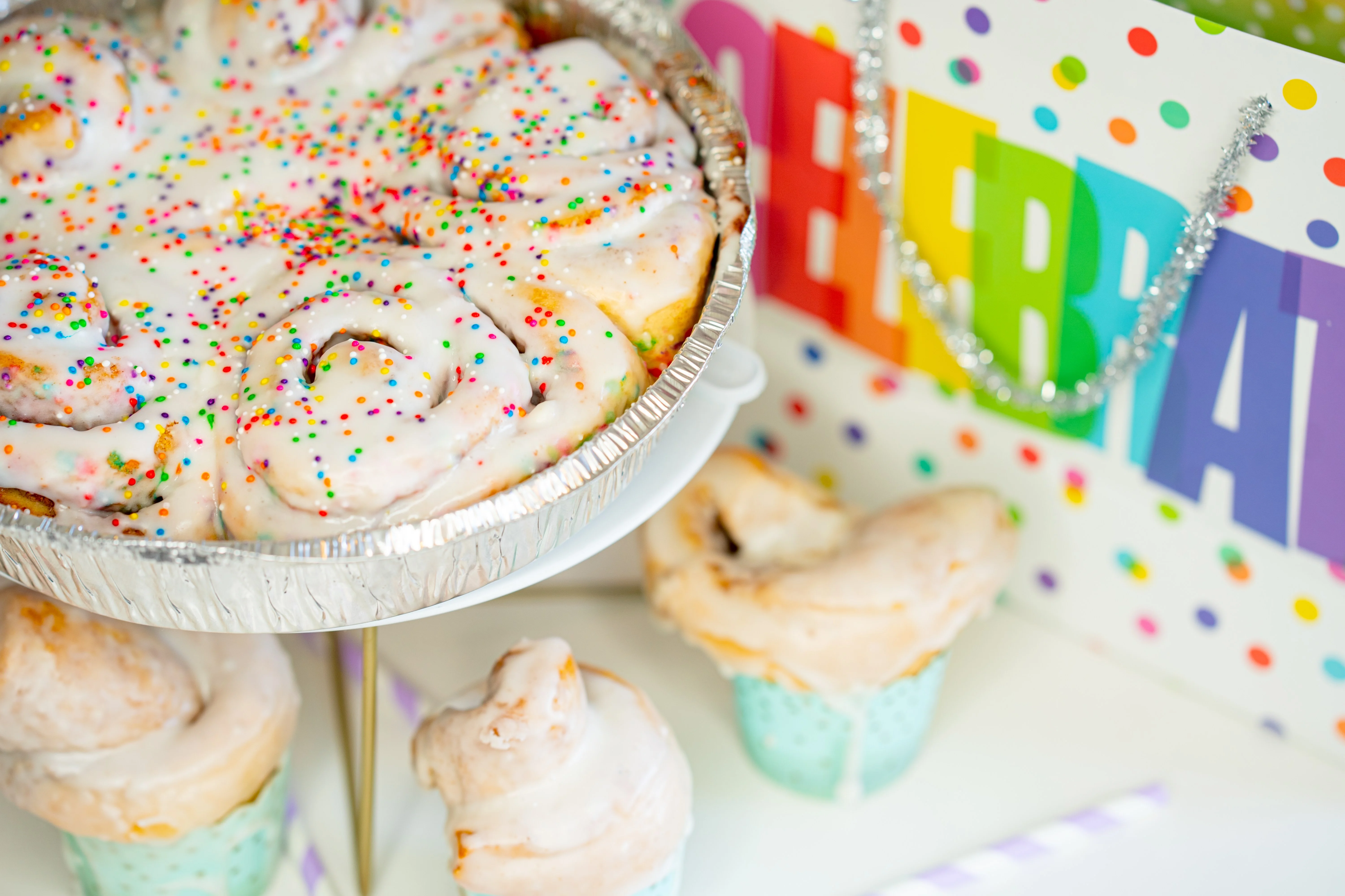 Colorful cinnamon rolls with sprinkles for celebration