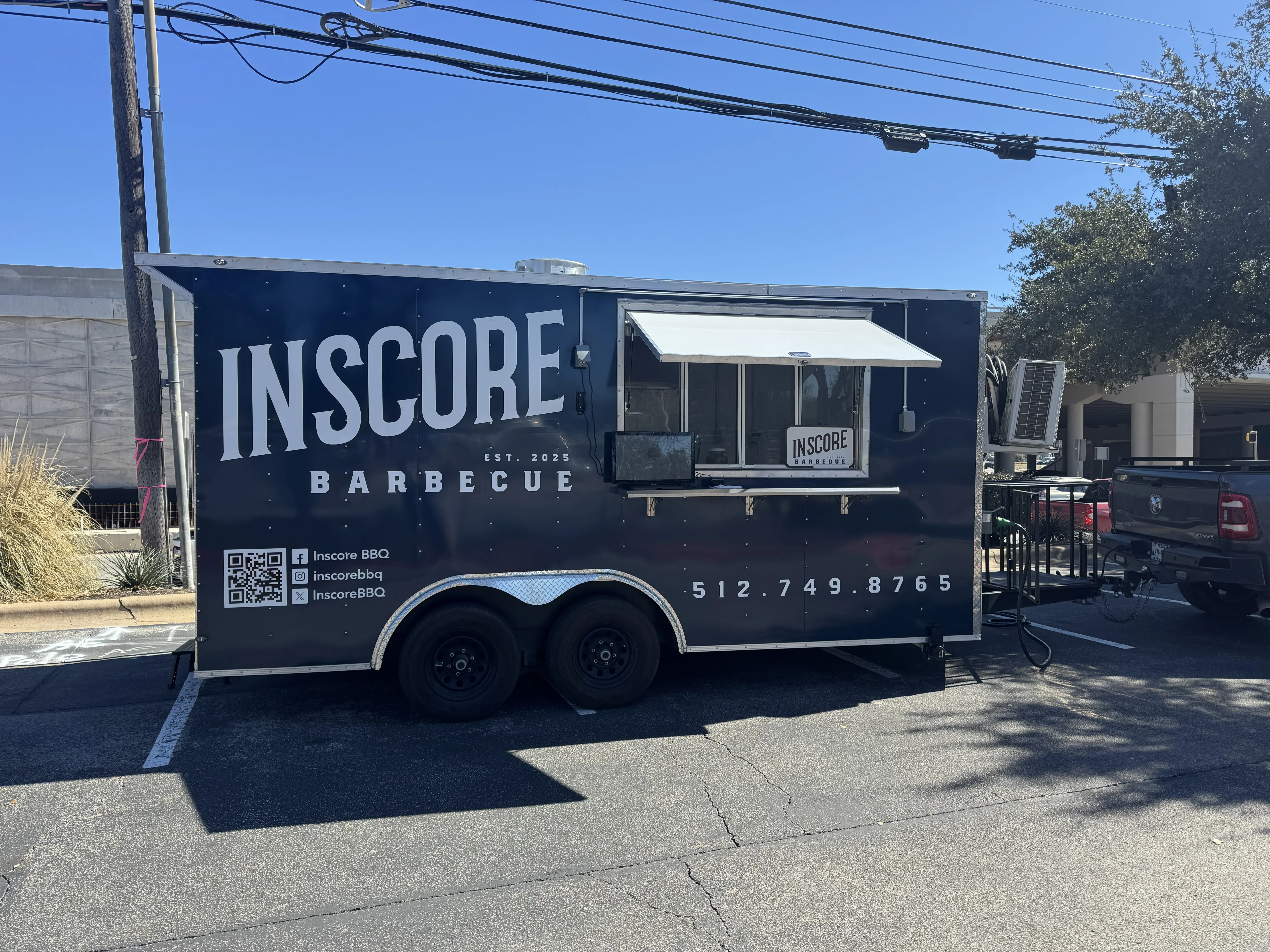 Food truck serving barbecue with a modern design