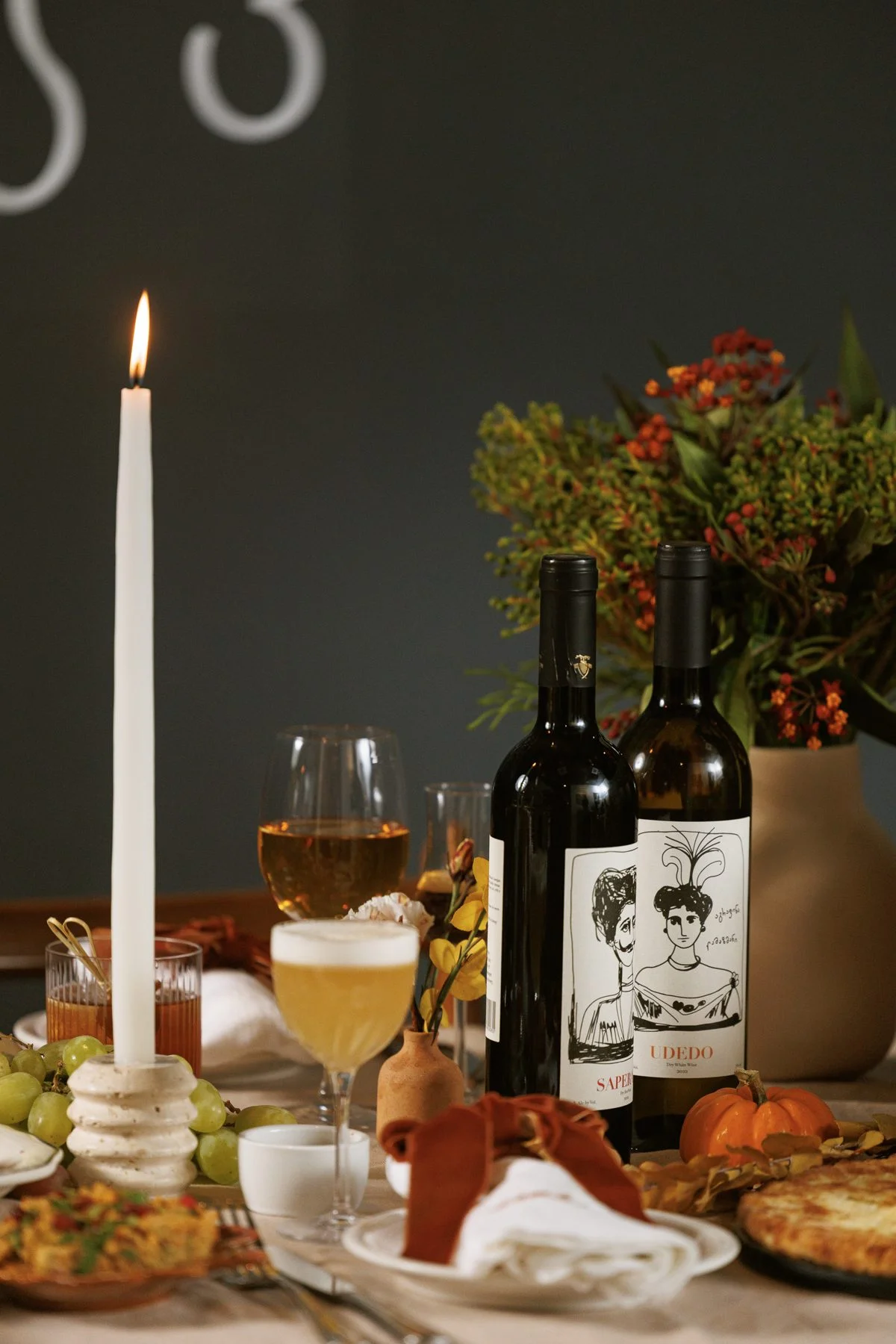 Amber wine on a candlelit supra table