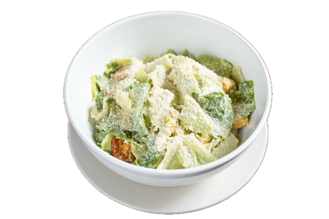 Classic Caesar salad topped with Parmesan cheese