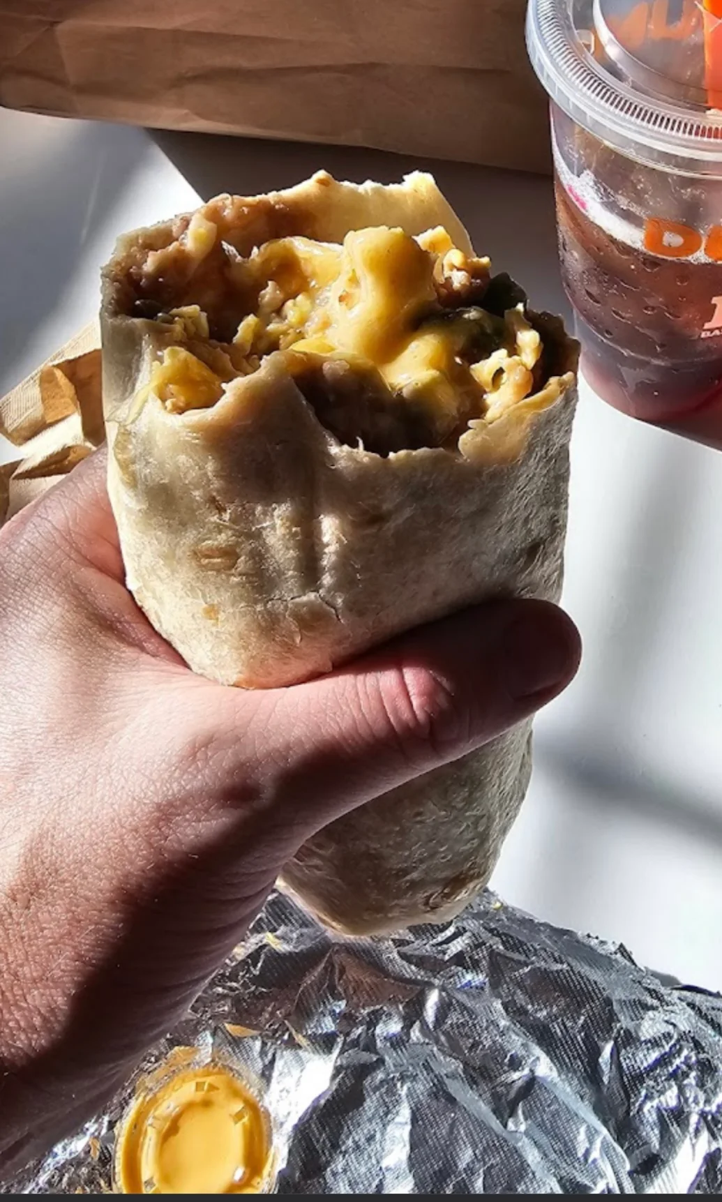 Delicious breakfast burrito wrapped in a tortilla