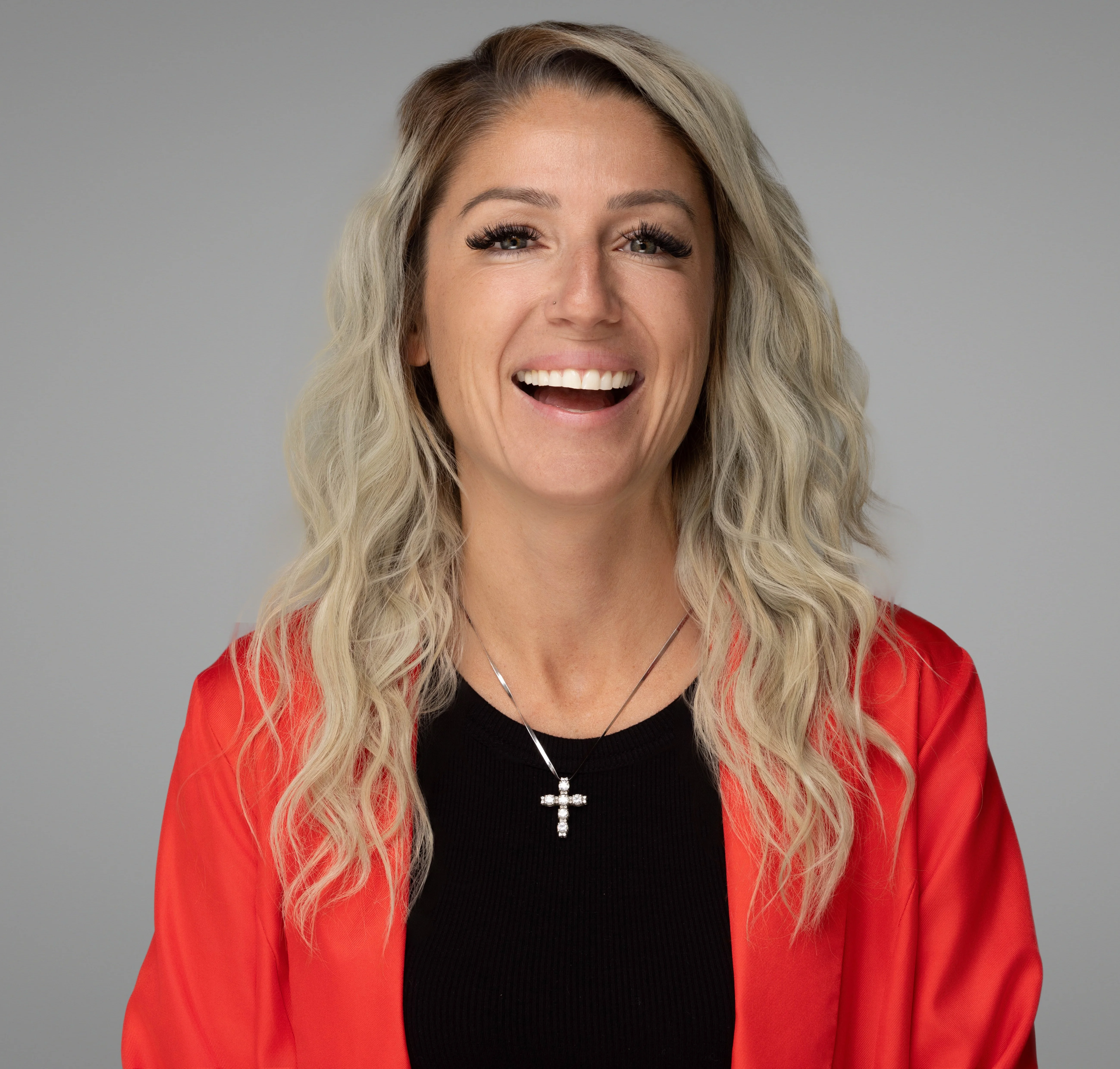 Professional headshot of a restaurant staff member.