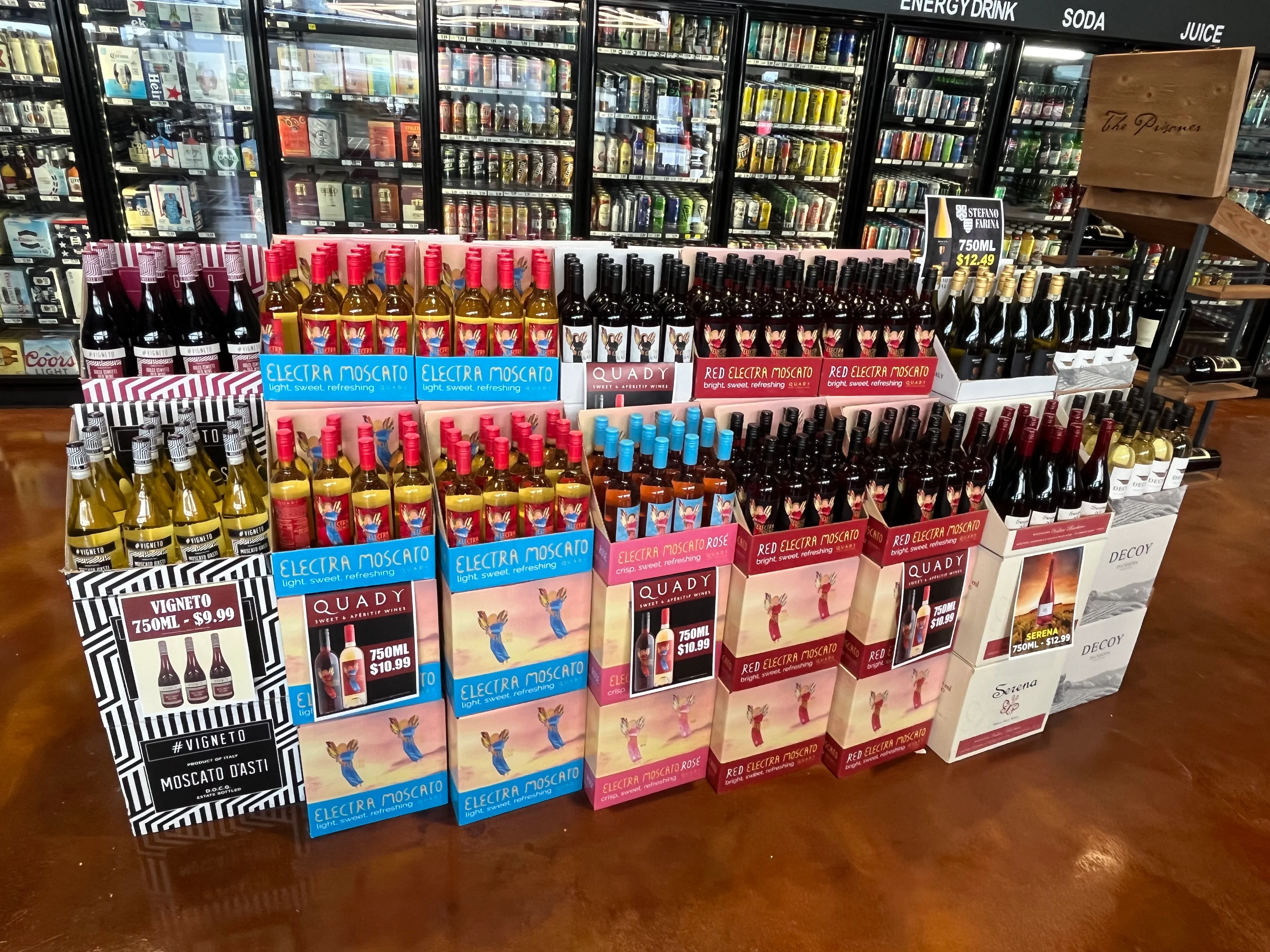 Display of assorted wines including Moscato and red varieties