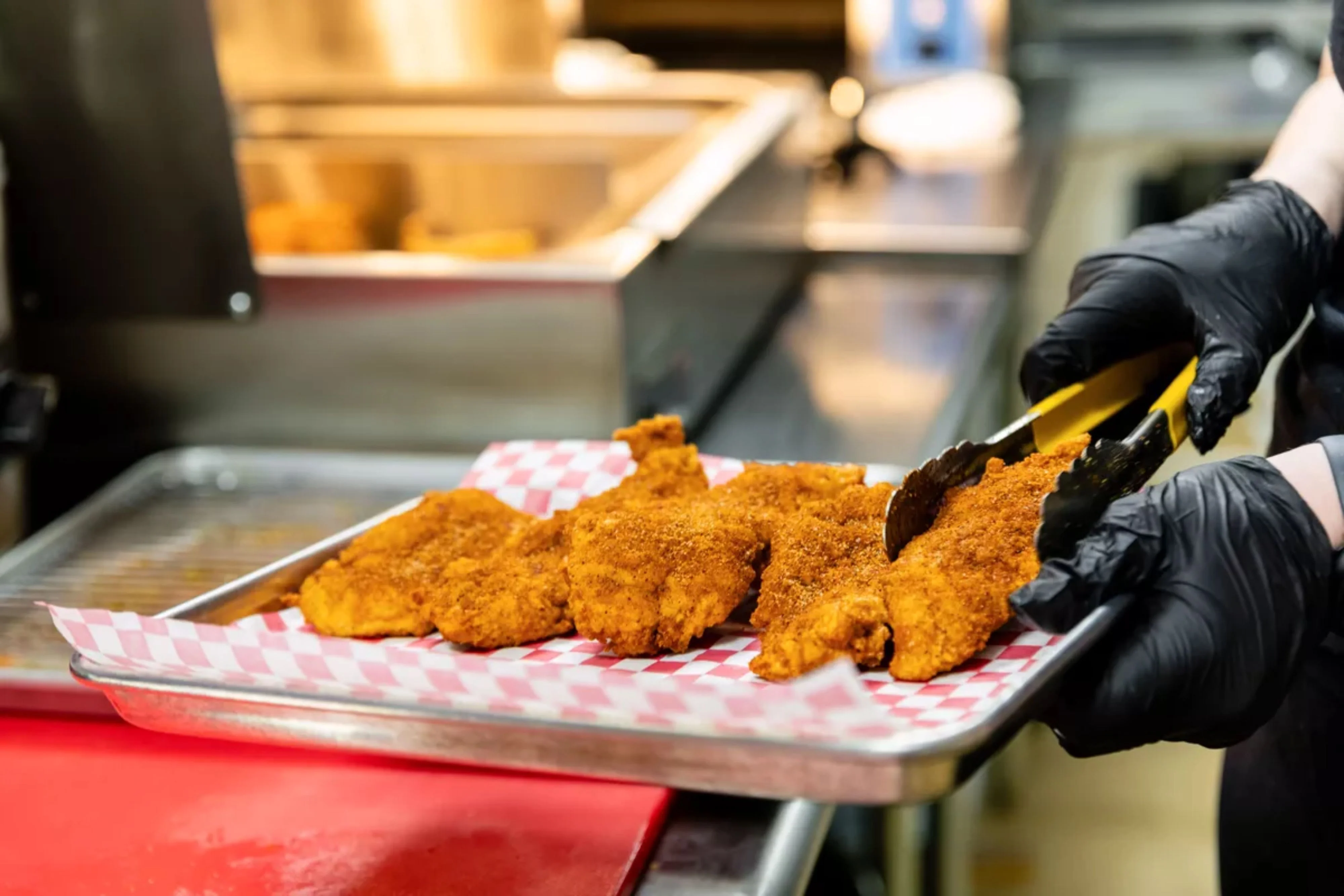 Chicken thighs being served