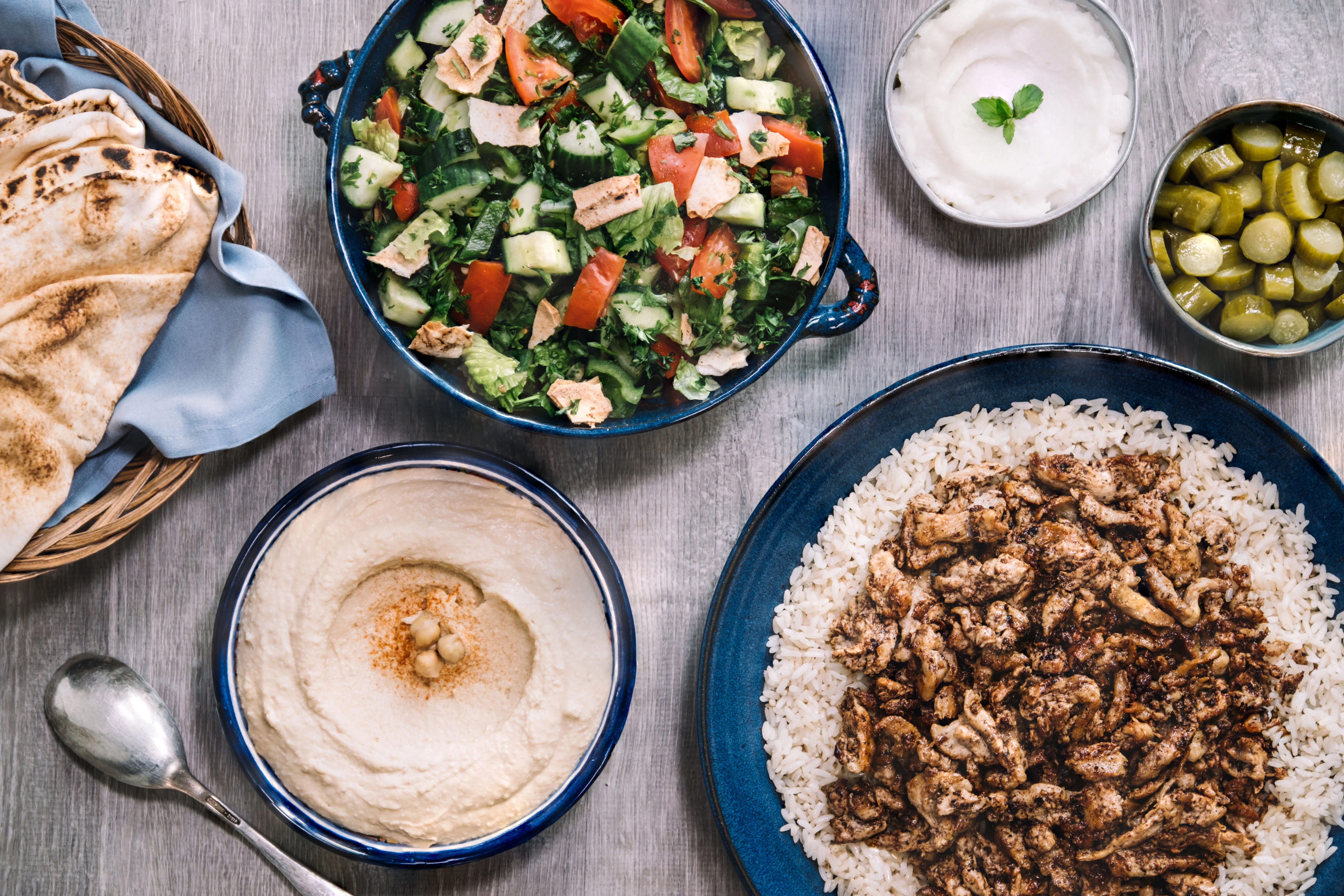 Middle Eastern chicken shawarma served with rice and salad