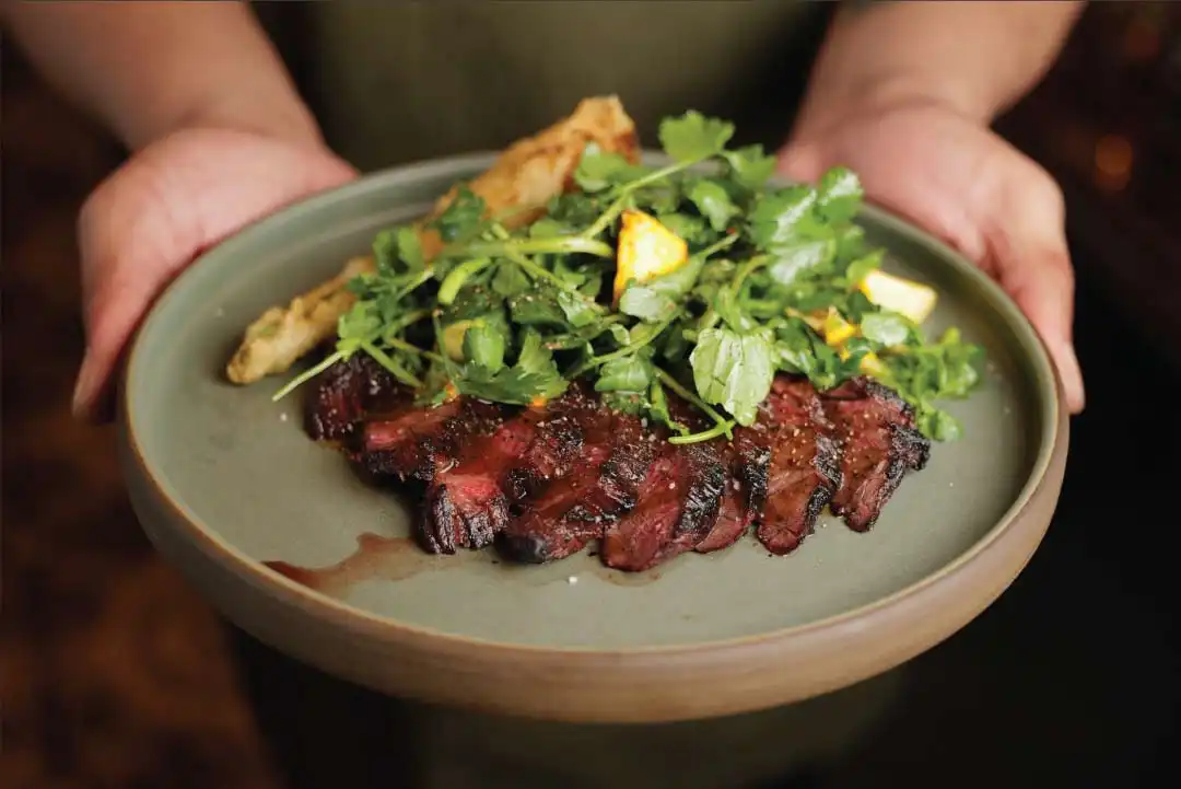 SNAKE RIVER FARMS WAGYU SKIRT STEAK Crispy Fingerling Potatoes, Tamari Marinated Mushrooms, Herbs.