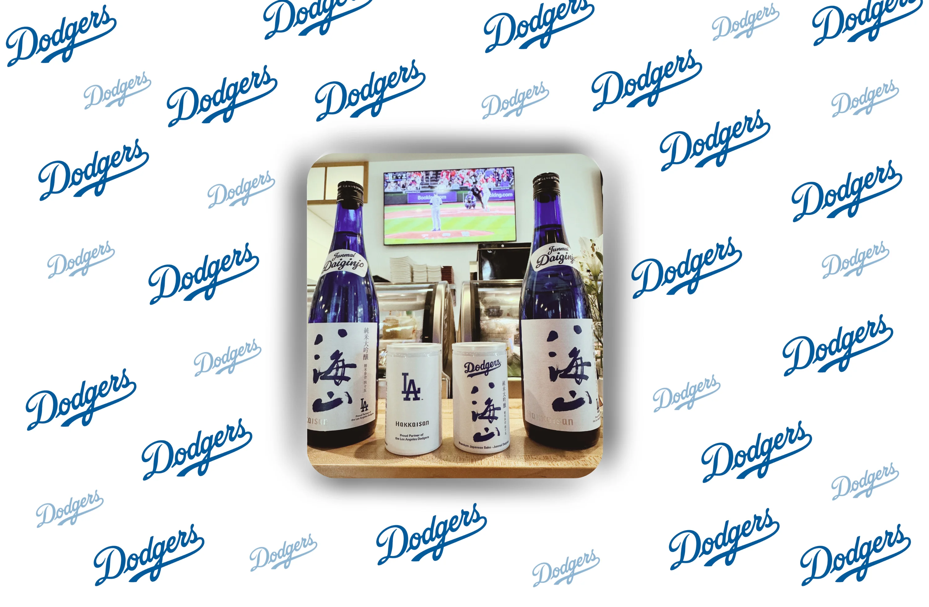 Variety of Japanese sake bottles on a bed of black stones