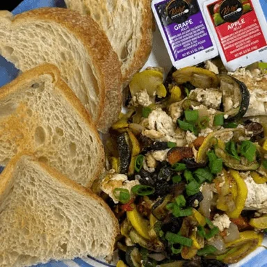 Sourdough toast with fresh veggies and an assortment of other nutritious ingredients. 