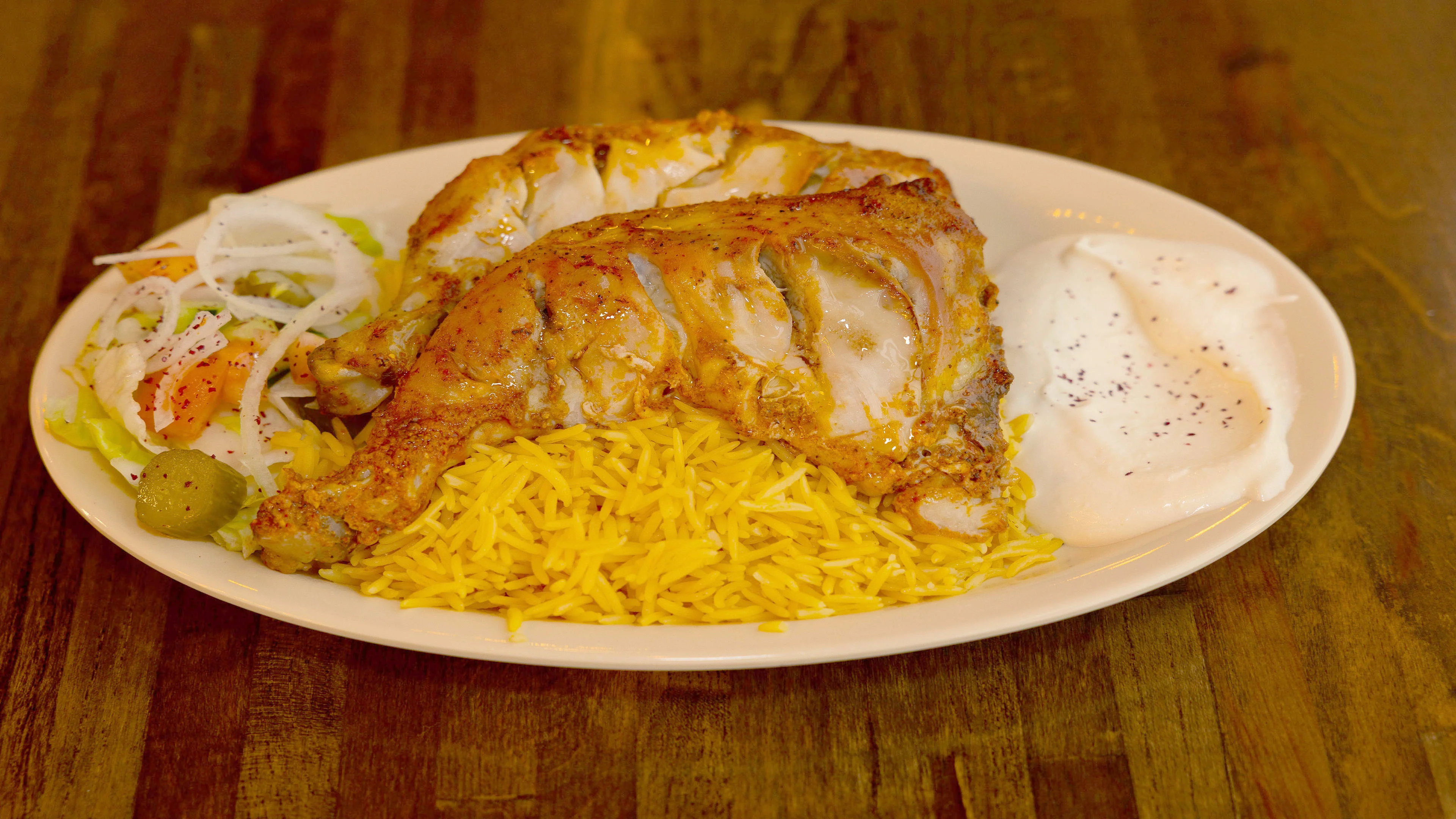 Pita Zone seasoned fish fillet served over basmati rice