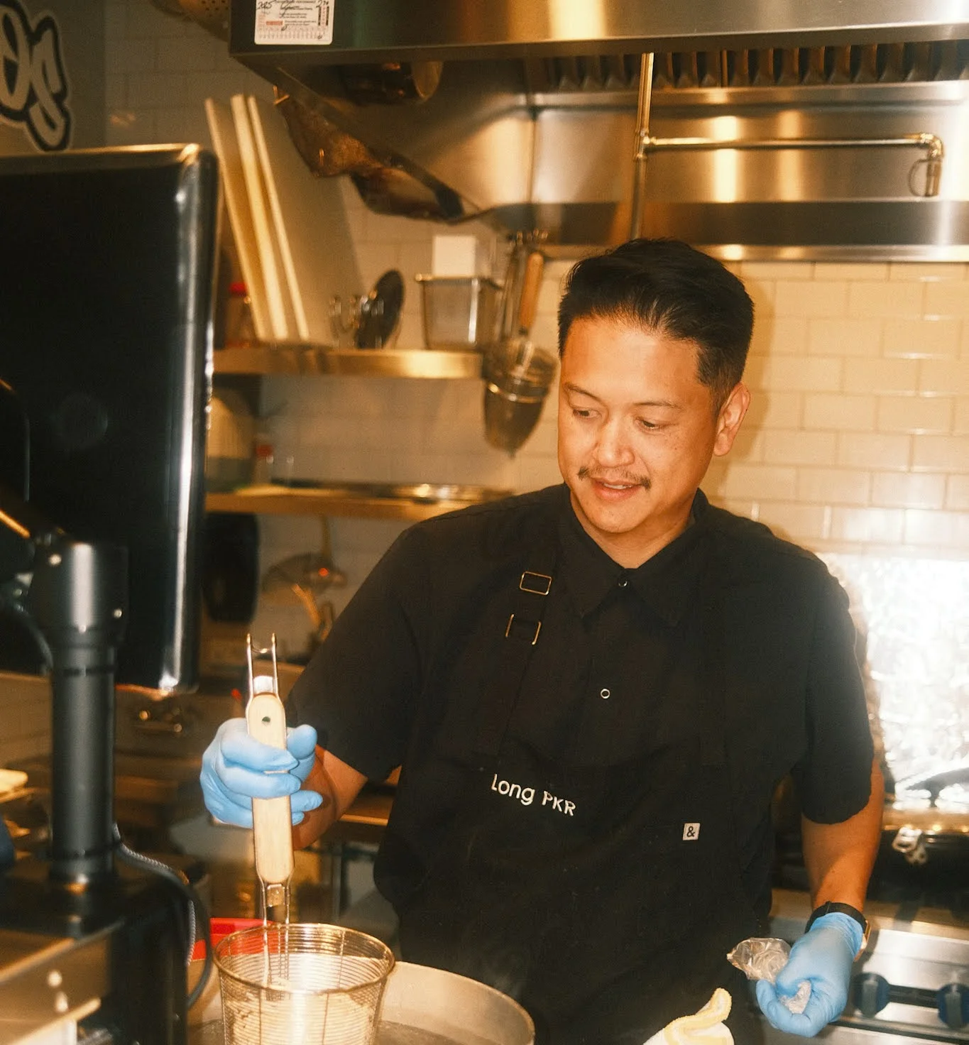 Chef preparing a dish in a modern kitchen