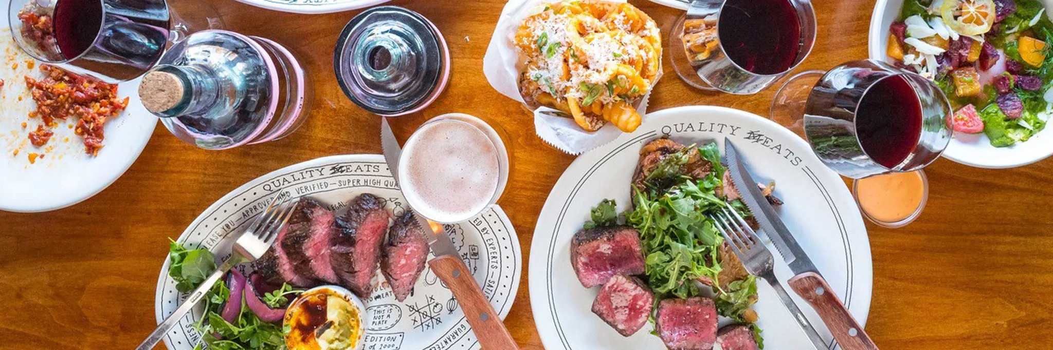 Grilled steak with sides in a modern restaurant setting