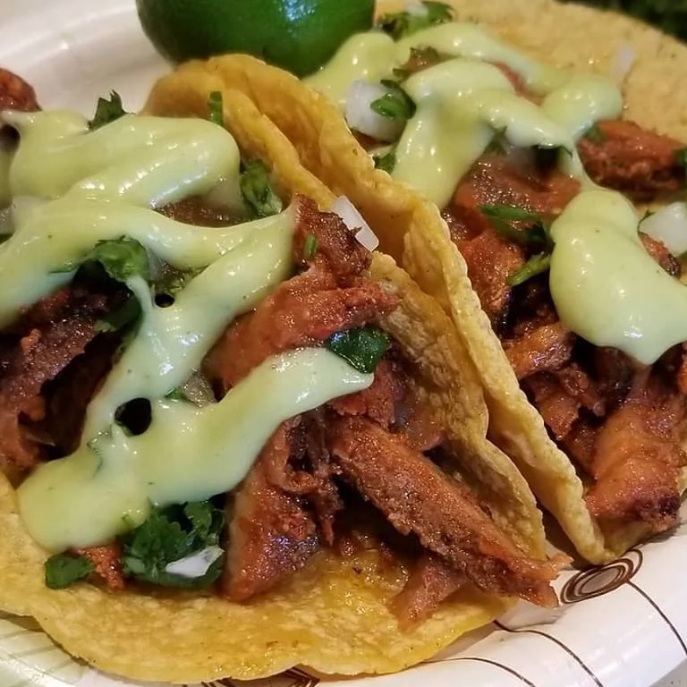 A plate of fresh made tacos from Tacos Tijuana