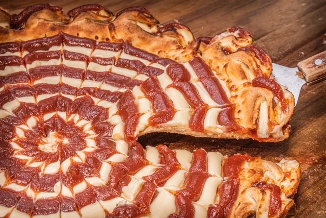 Artisan pepperoni pizza with unique spiral design