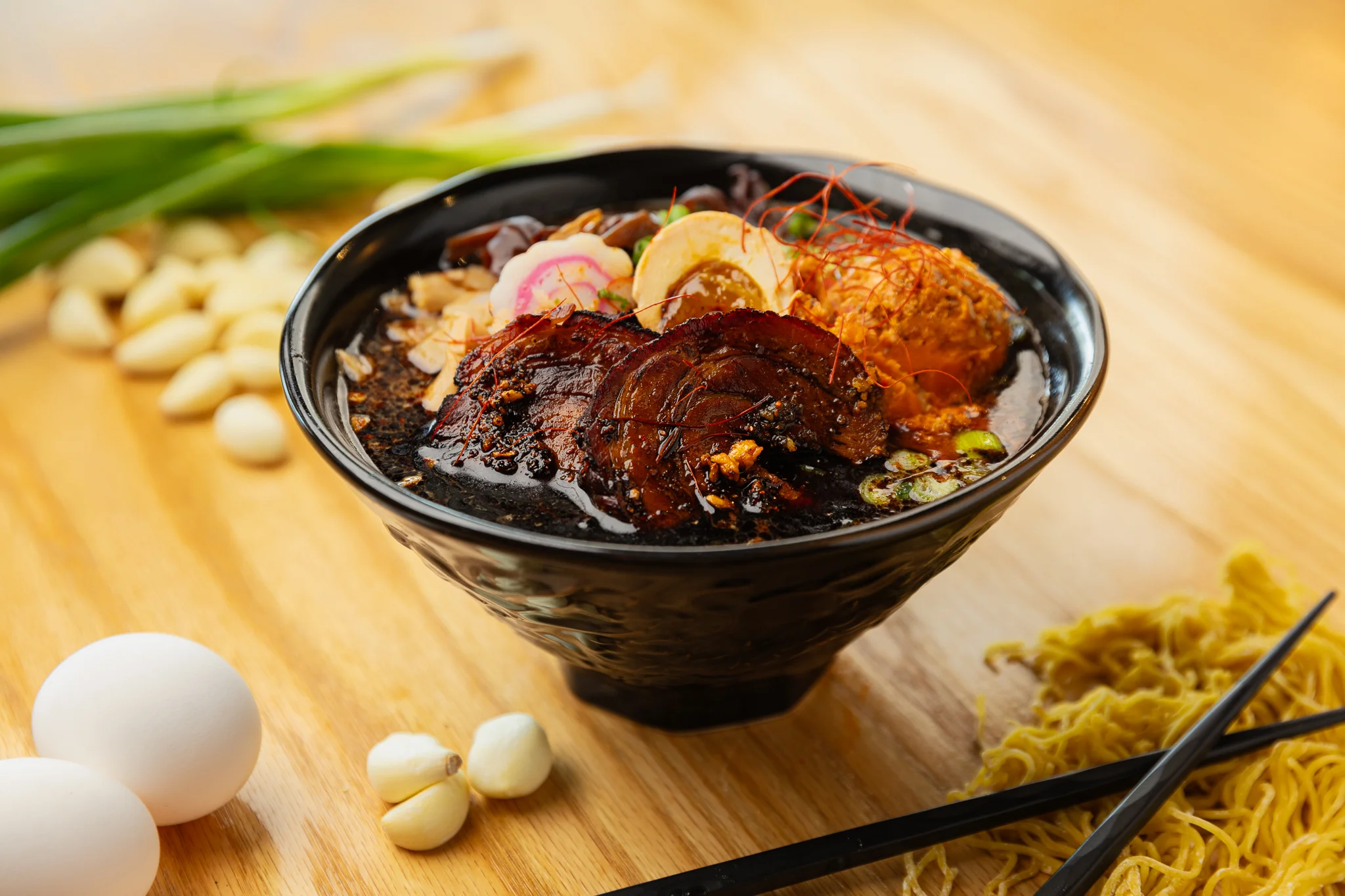 Bowl of Chinese ramen with rich broth and toppings