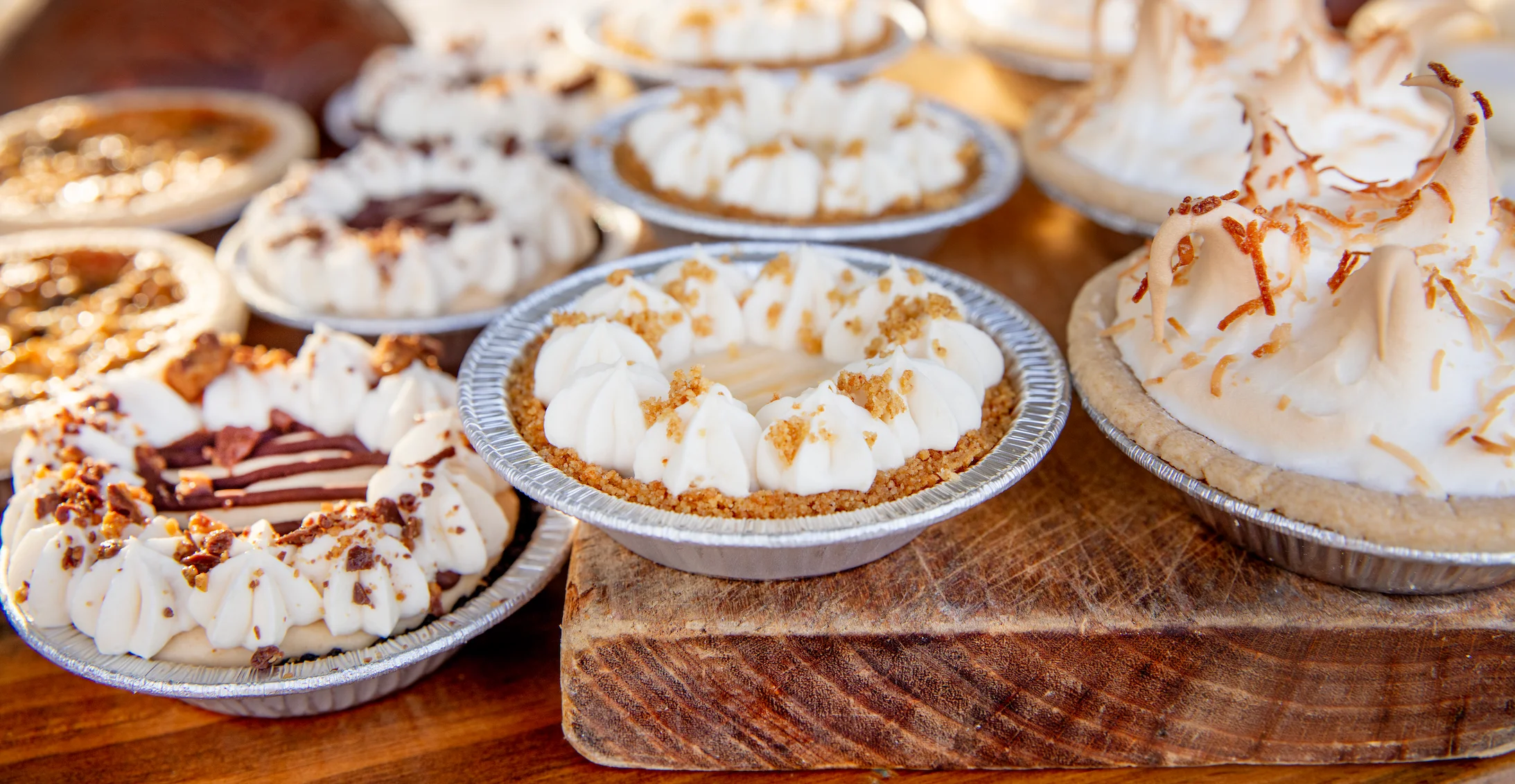 Assorted mini pies including key lime and chocolate cream