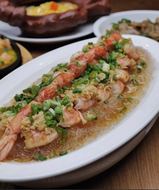 Steamed shrimp with glass noodles in a savory sauce