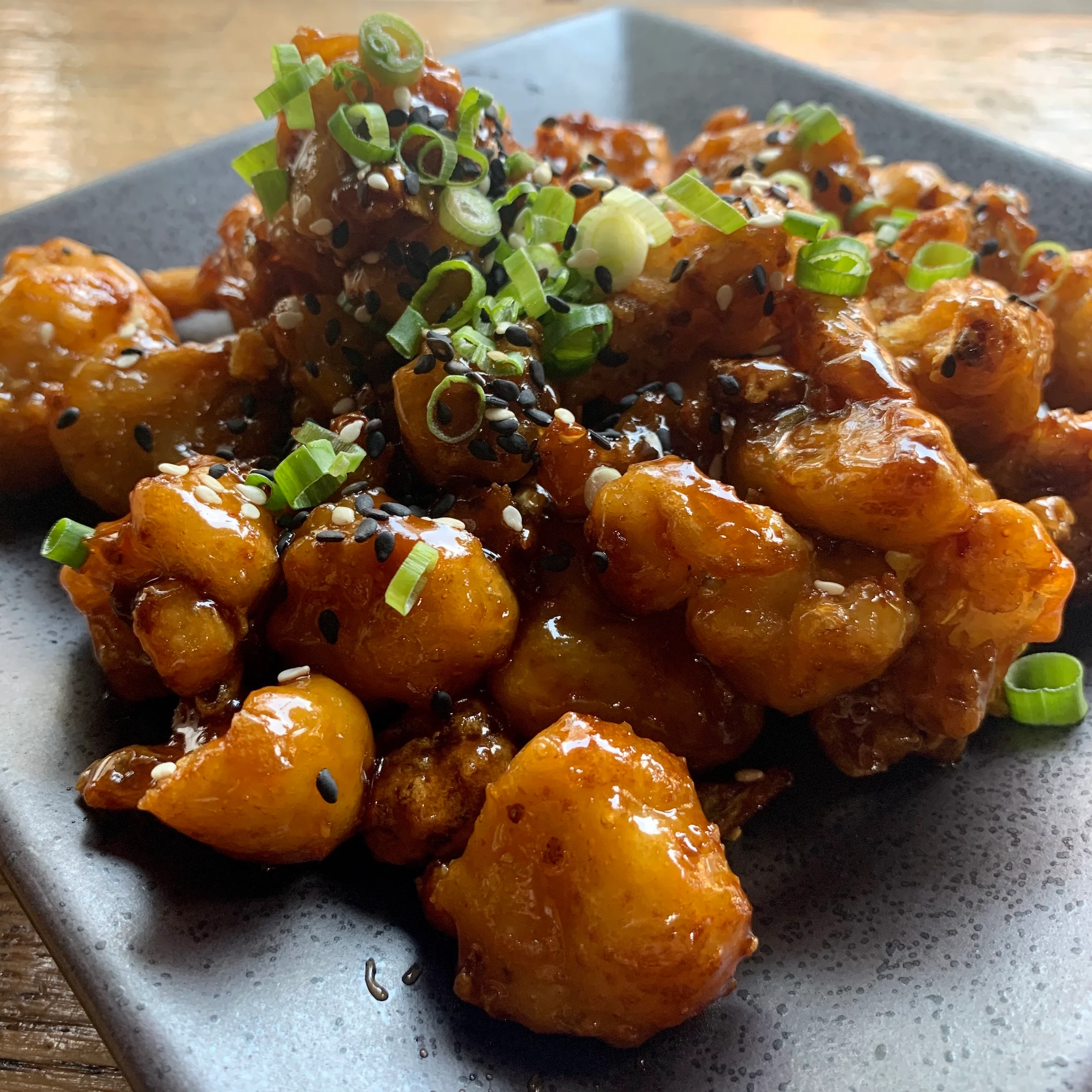 Crispy General Tso's cauliflower with sesame and green onions