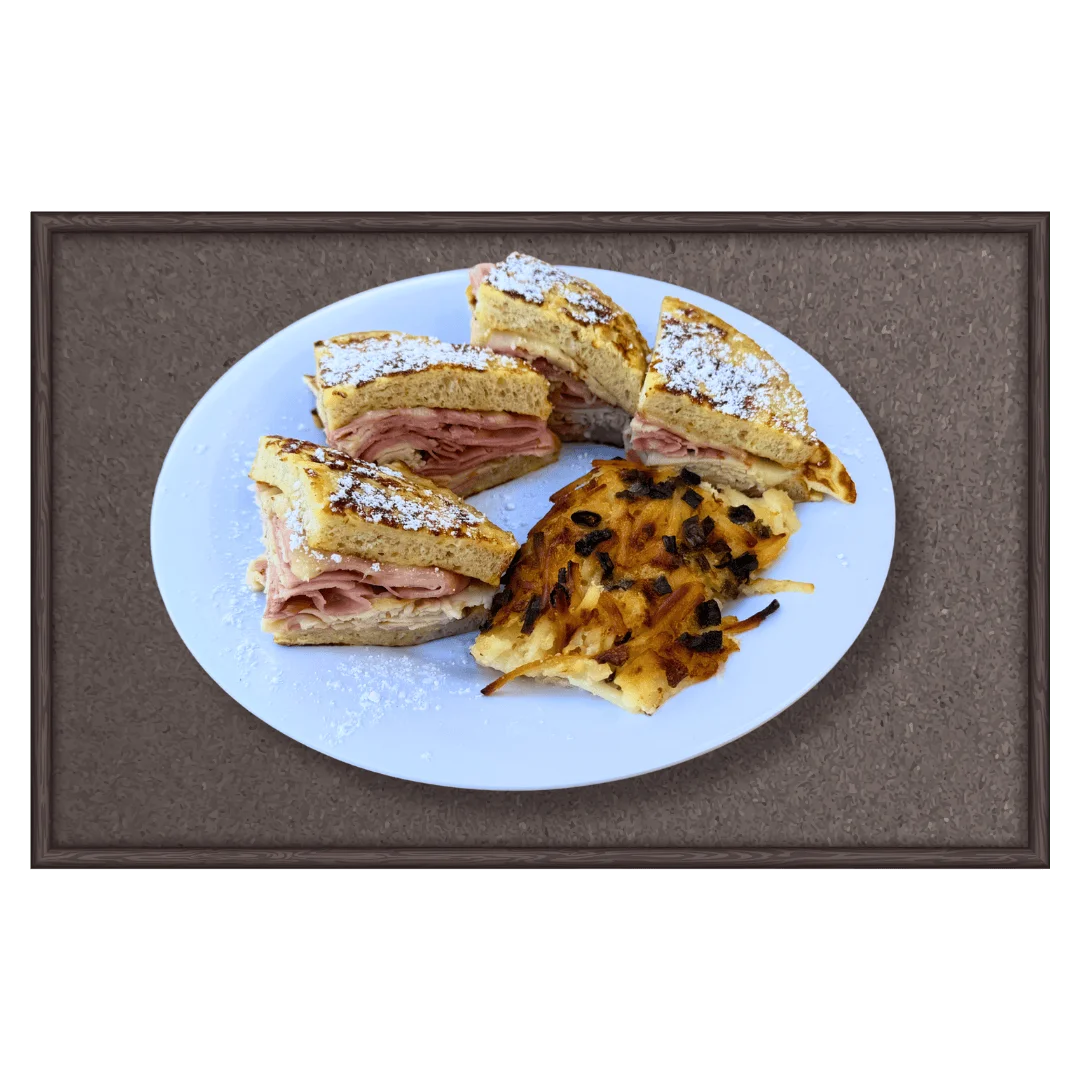 French toast sandwich with ham and powdered sugar