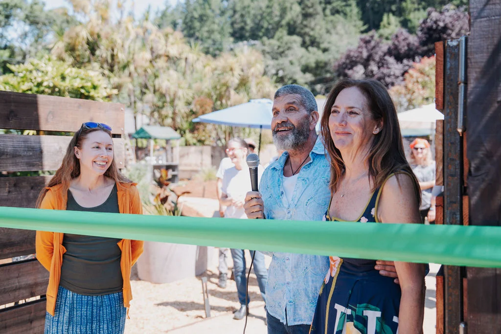 Ribbon cutting ceremony at a restaurant opening