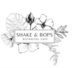 Logo of Shake & Bops Botanical Cafe with floral design