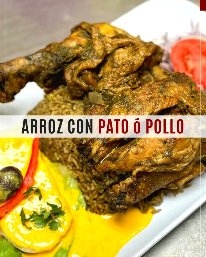 Peruvian arroz con pato served with salad and sauce