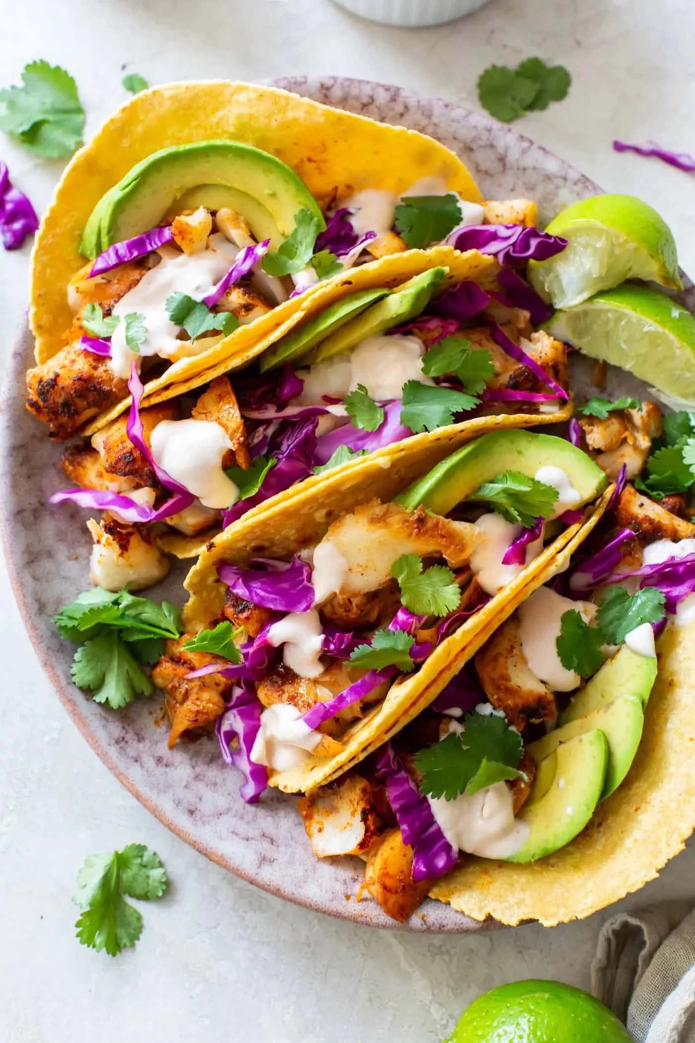 Delicious fish tacos with avocado and cabbage