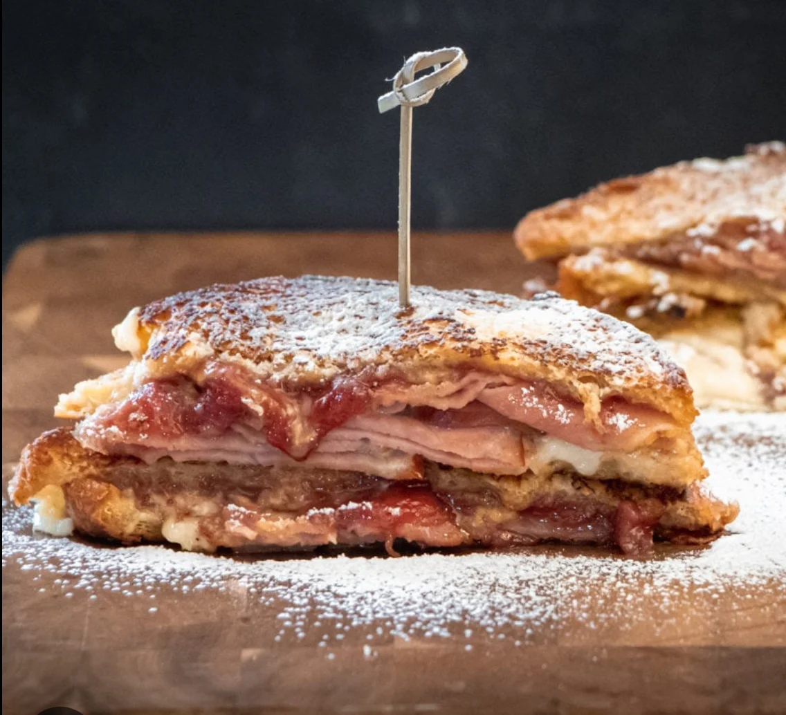 Croque Monsieur sandwich with powdered sugar