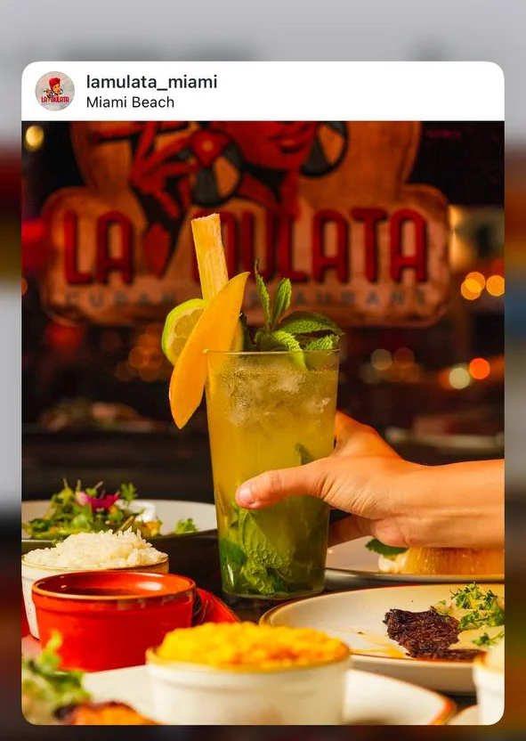 Refreshing mojito cocktail with mint and citrus in a vibrant restaurant setting