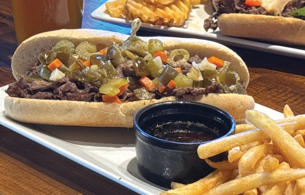 Italian beef sandwich with giardiniera and fries