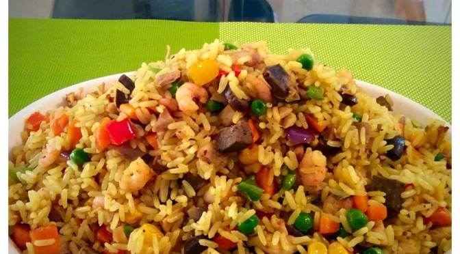 Colorful plate of fried rice with shrimp and vegetables