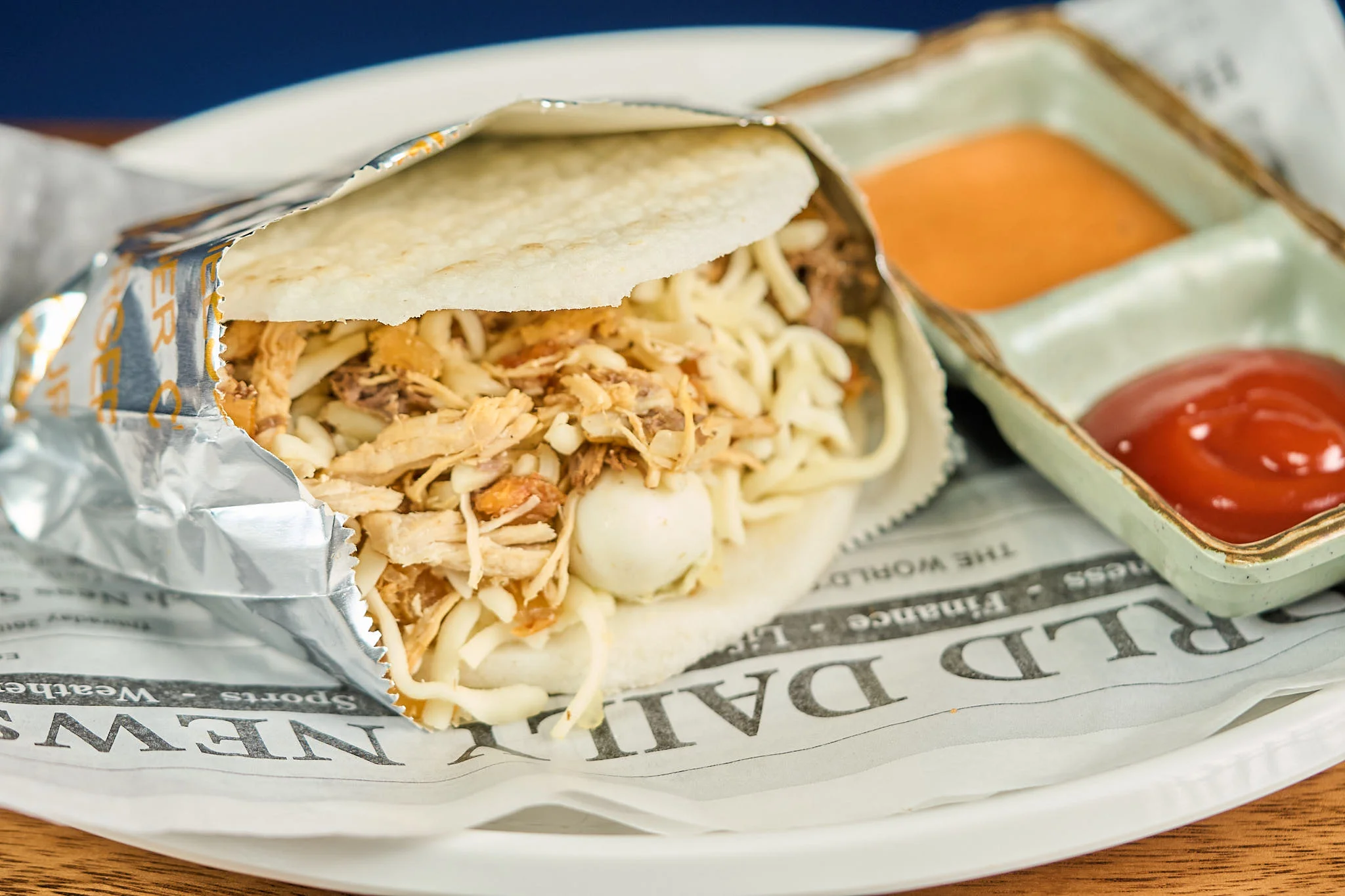 Delicious Mexican taco al pastor with chicken and sauces