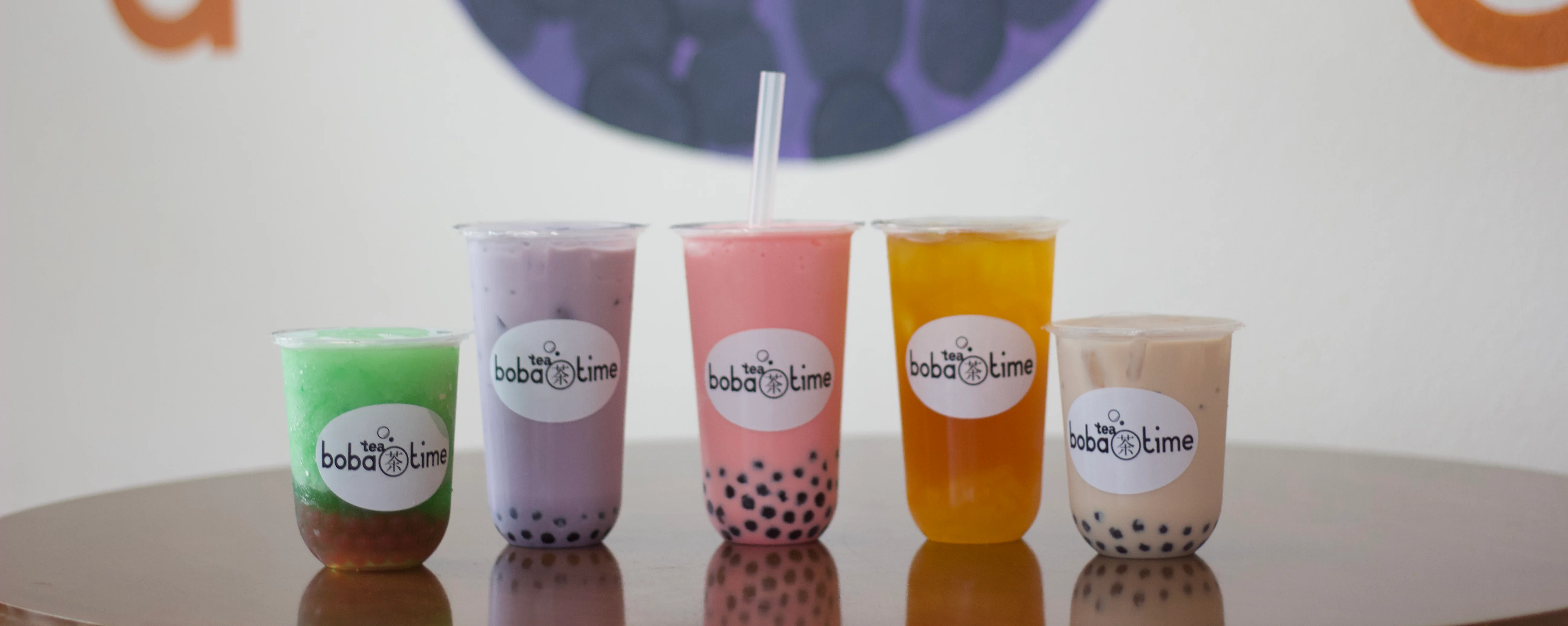 Variety of colorful bubble teas at a boba tea shop