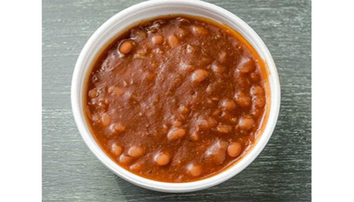 Mojo BBQ Beans from VooDoo BBQ in Pensacola, a slow-cooked side of smoky seasoned barbecue beans.