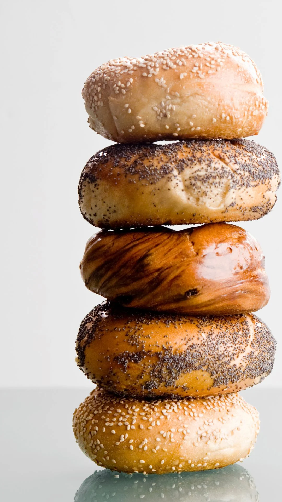 Stacked New York style bagels from nosh NY bagelsnear Ridgeland and Okatie with assorted flavors