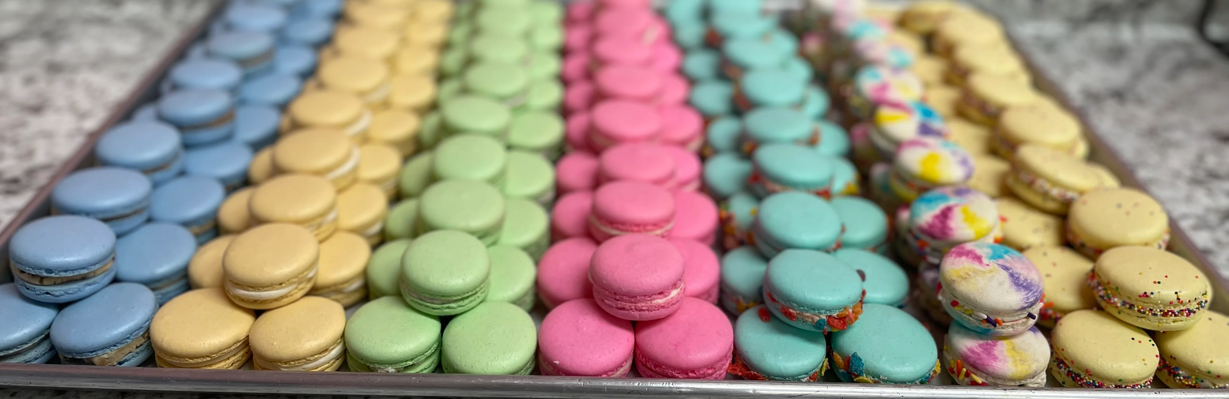 Colorful assortment of French macarons on a tray