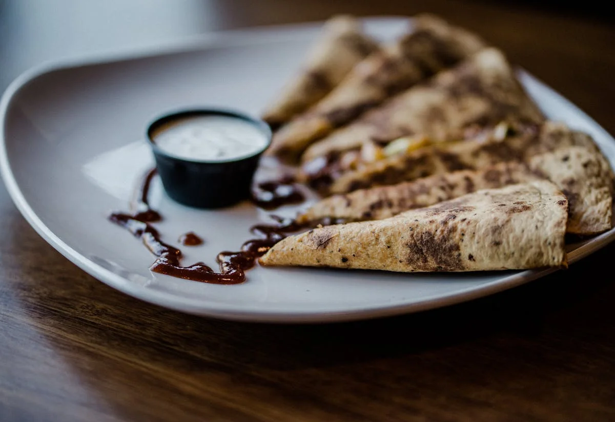 Crispy quesadillas served with dipping sauce