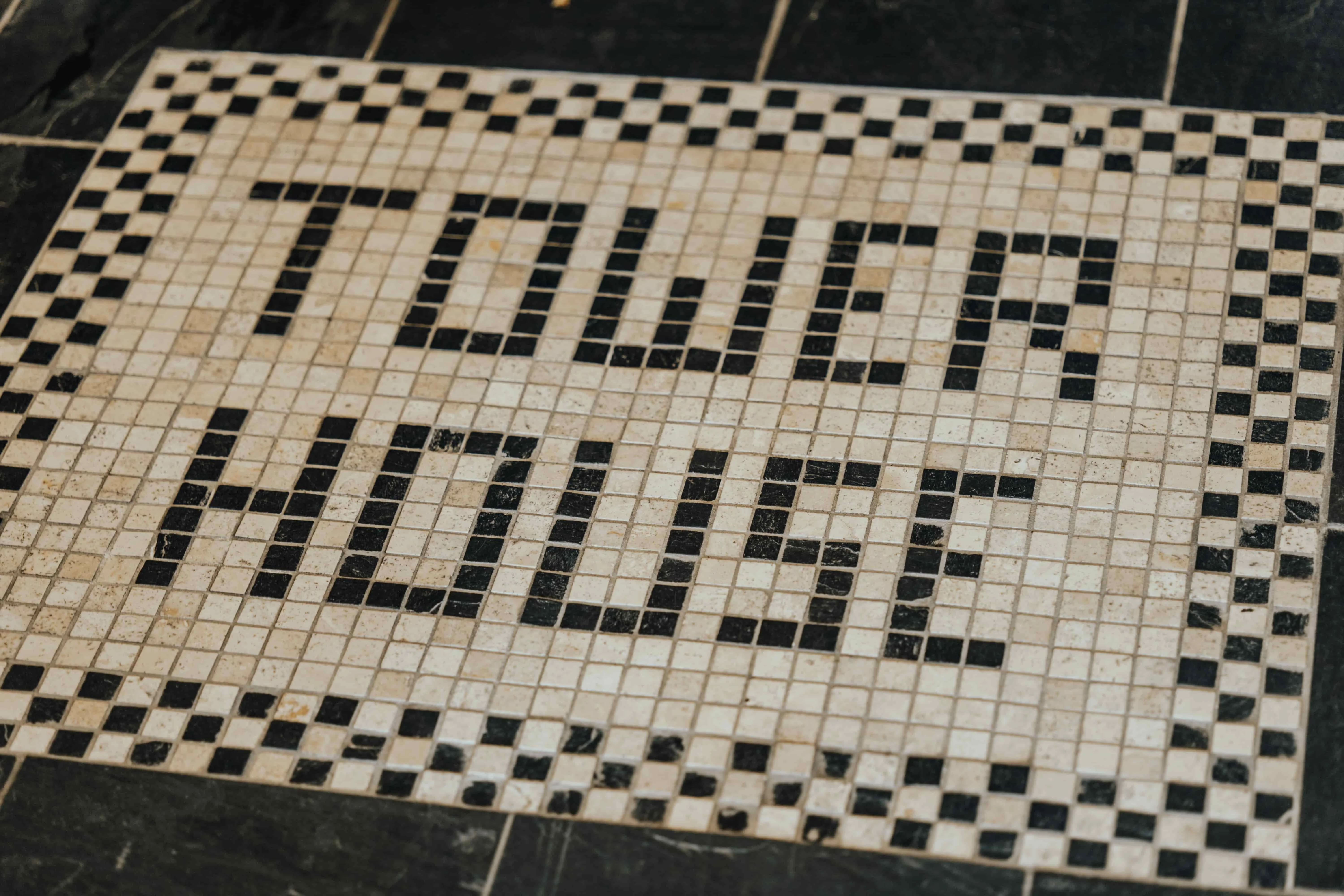 Mosaic tile entrance with 'Tower House' inscription