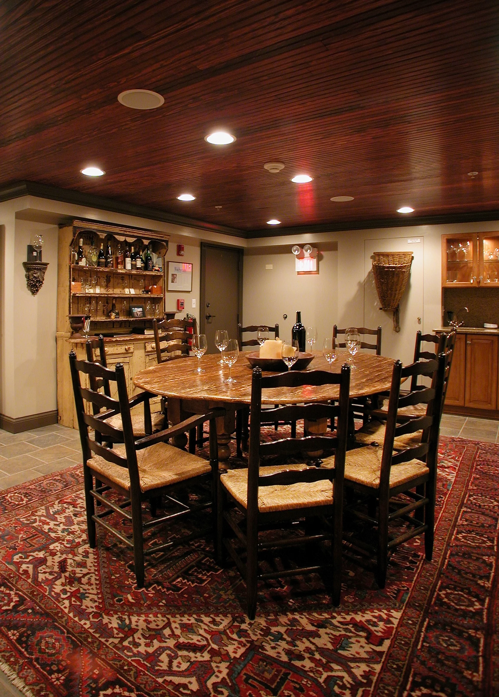 Elegant rustic dining room with wooden table and chairs