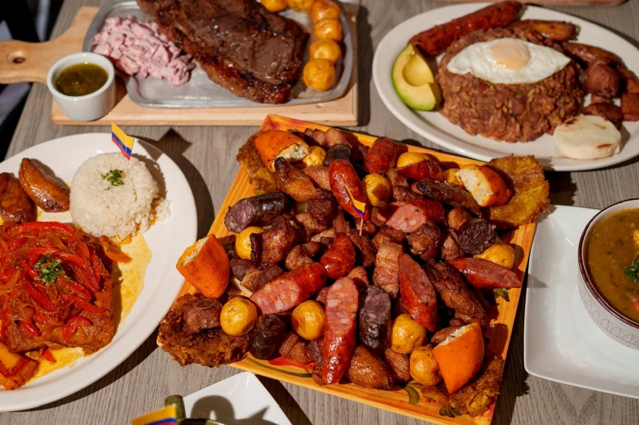 Vibrant restaurant interior with diverse Colombian dishes