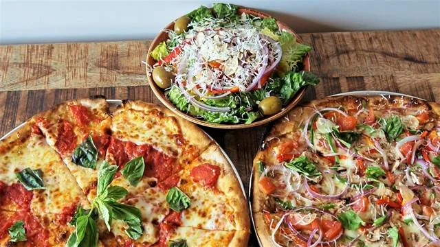 Delicious Margherita pizza and fresh garden salad