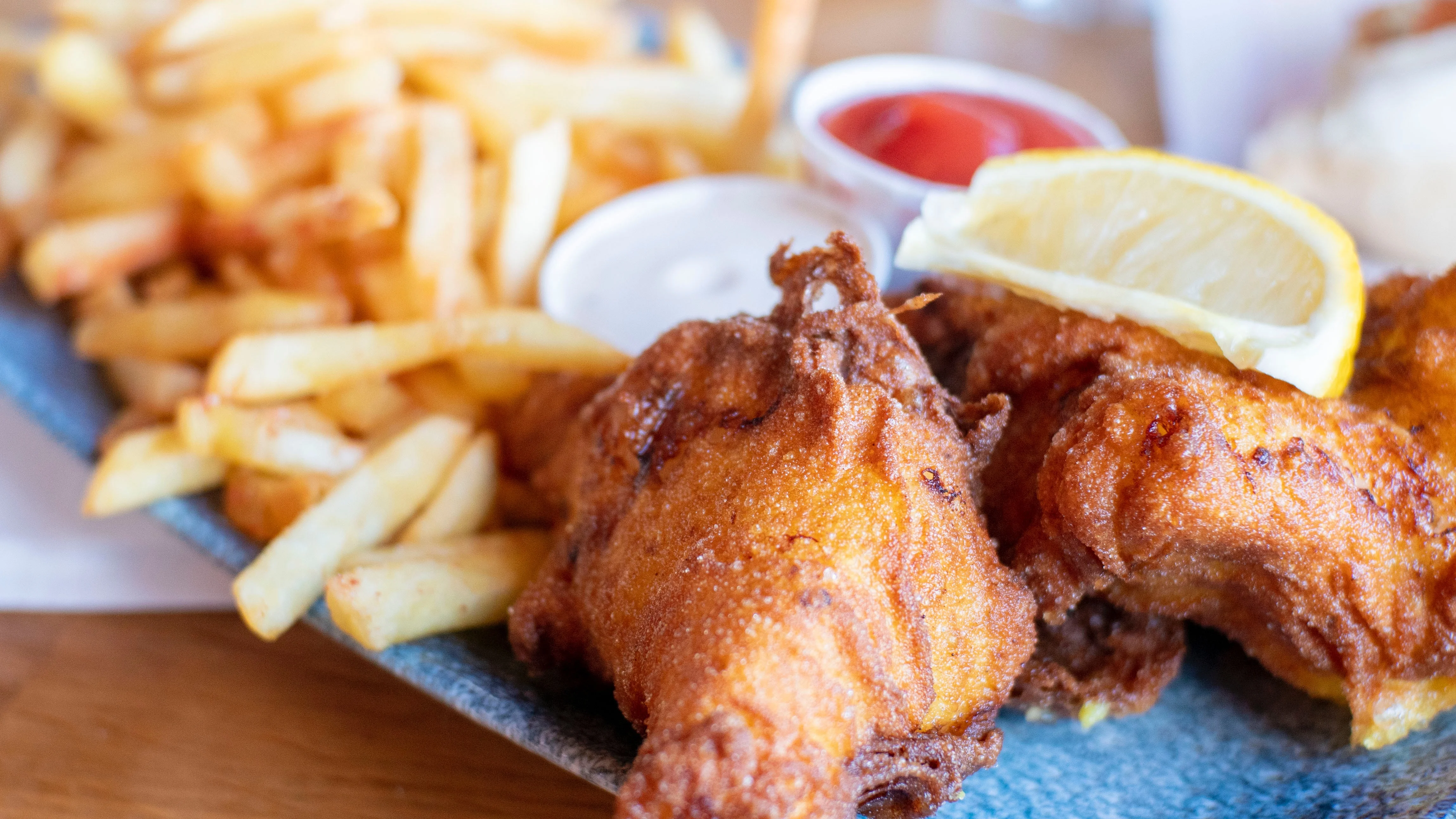 Crispy Southern fried chicken with fries and dipping sauces