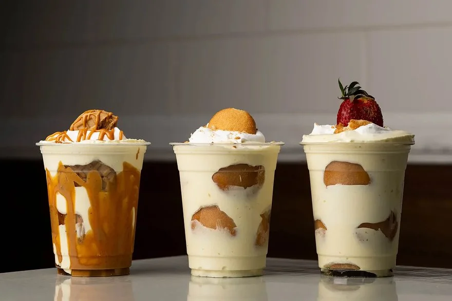 Decadent dessert cups with layered vanilla pudding and toppings