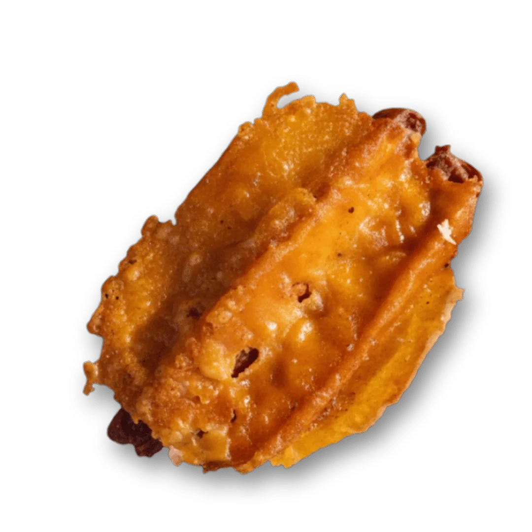 Crispy Mexican churro with a golden-brown exterior