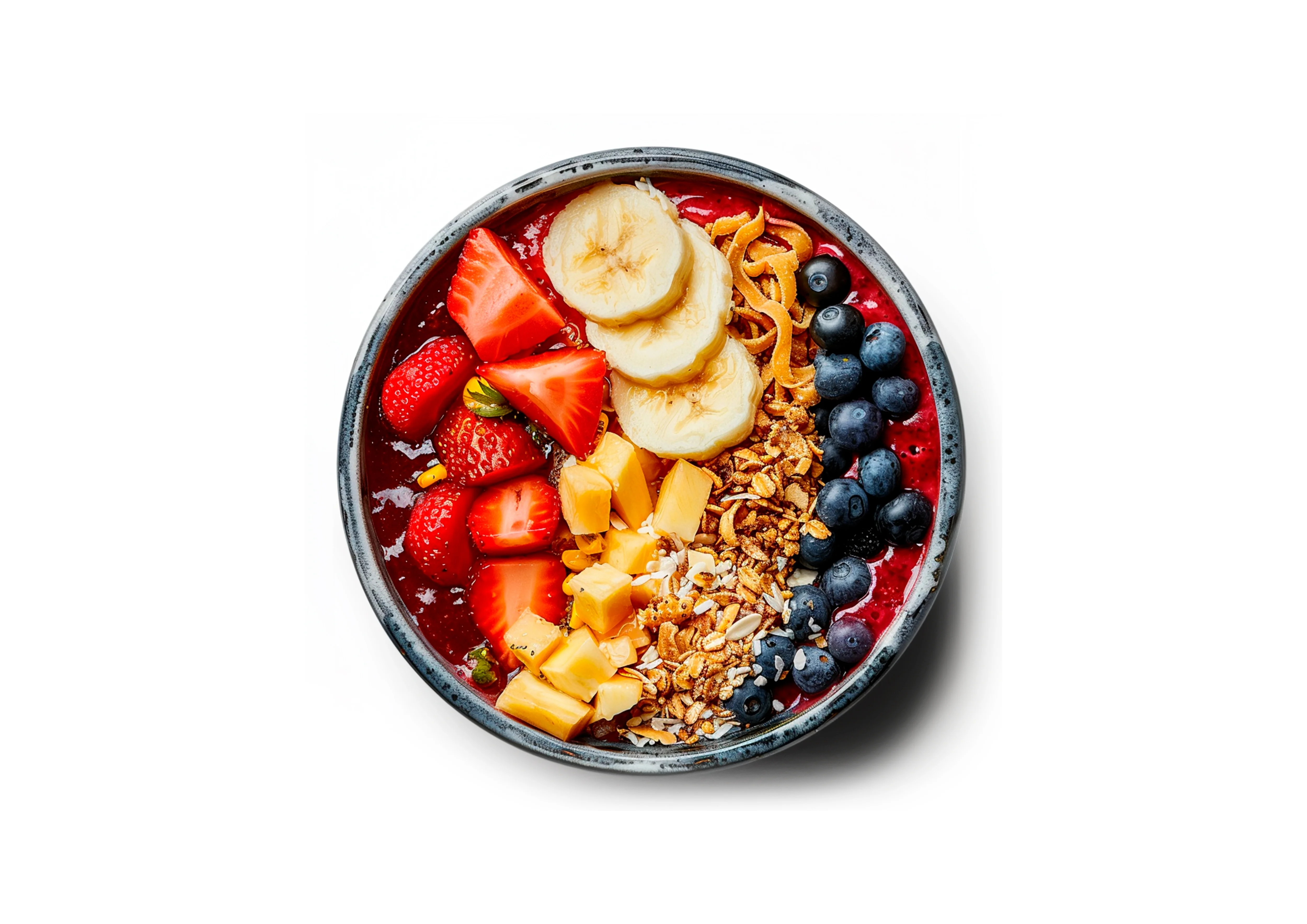 Colorful acai bowl topped with fresh fruits