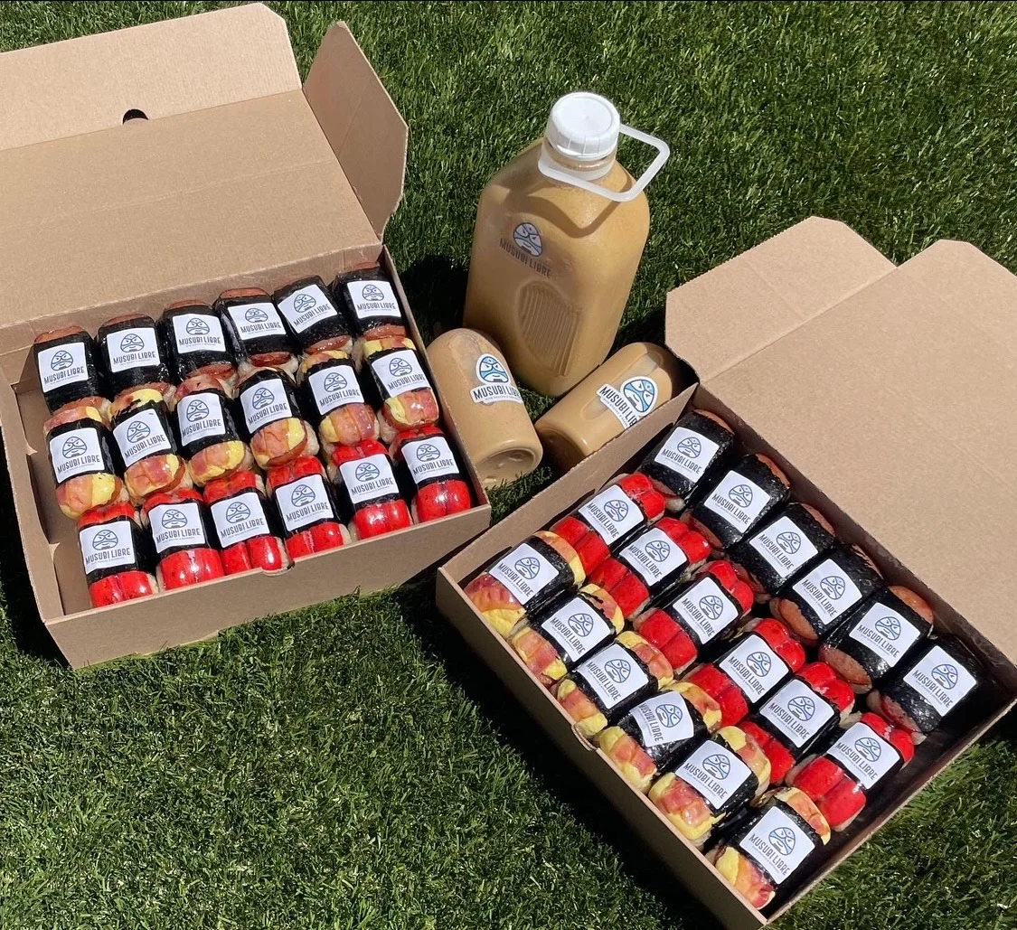 Assorted fruit cups and beverages in eco-friendly packaging